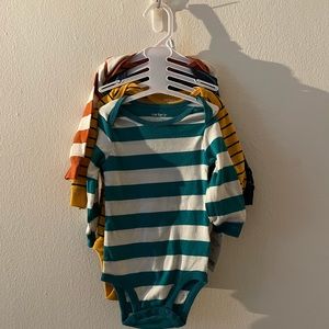 4 pack long sleeve bodysuit NEW